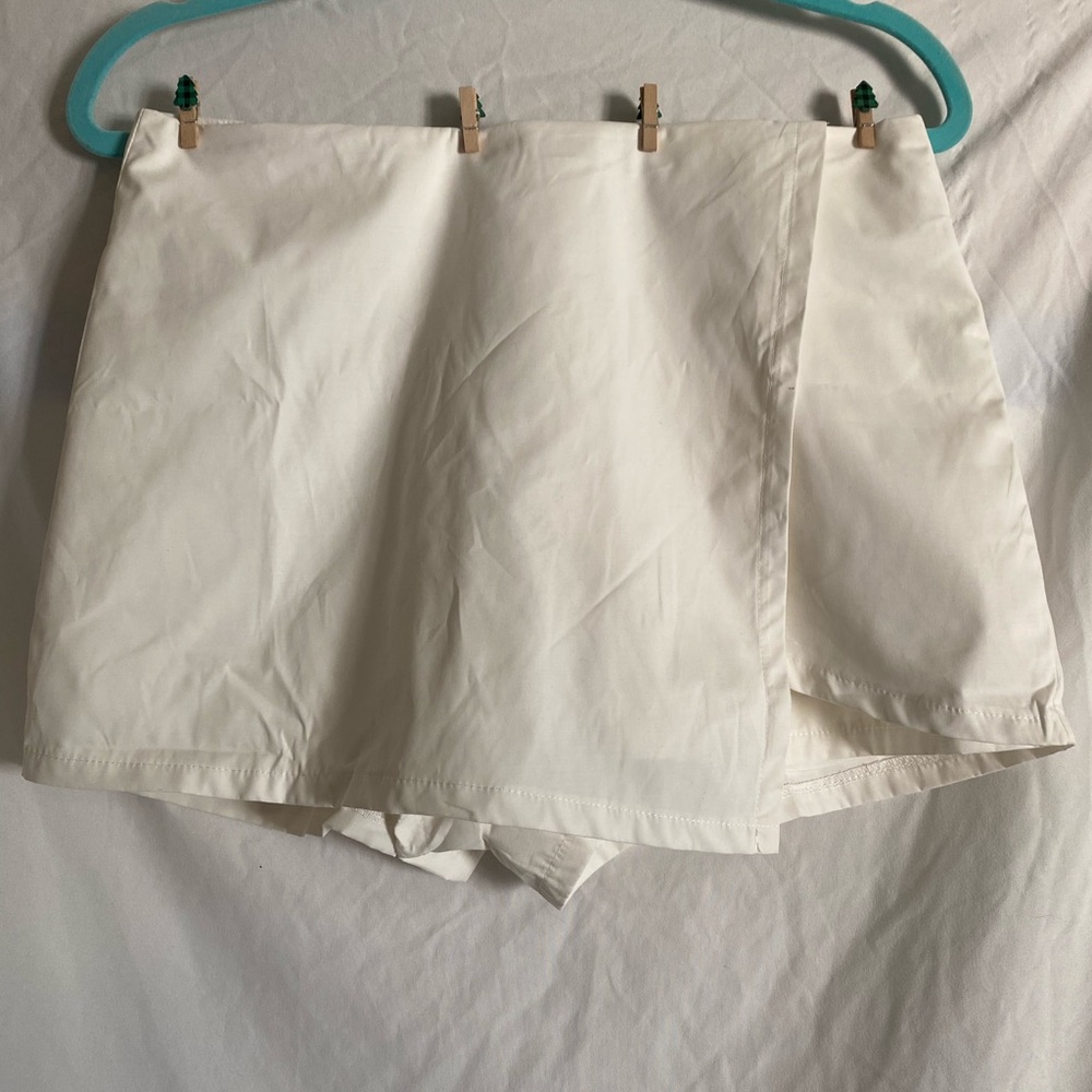 White asymmetrical high-waisted skort